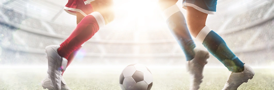 two foots and ball